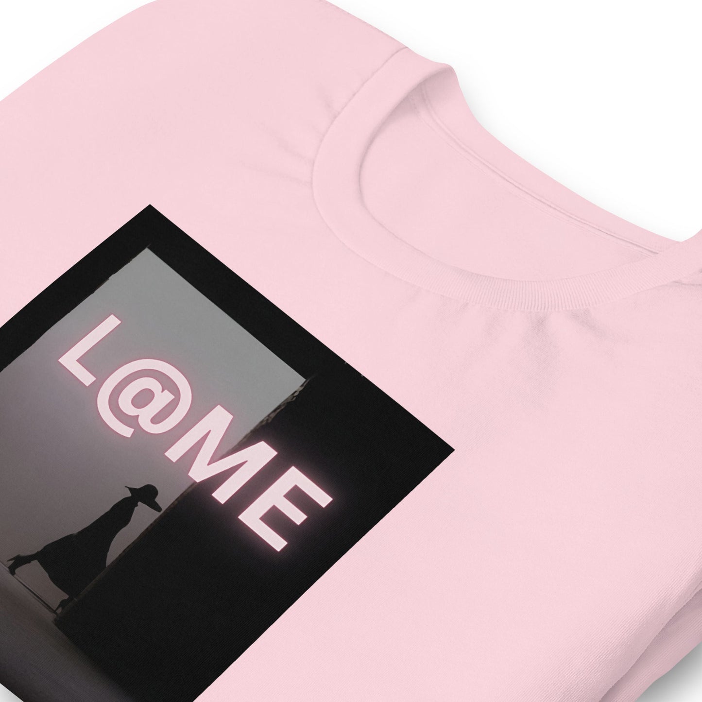 Blush-pink unisex tee with shadowed doorway graphic and bold L@ME logo on front