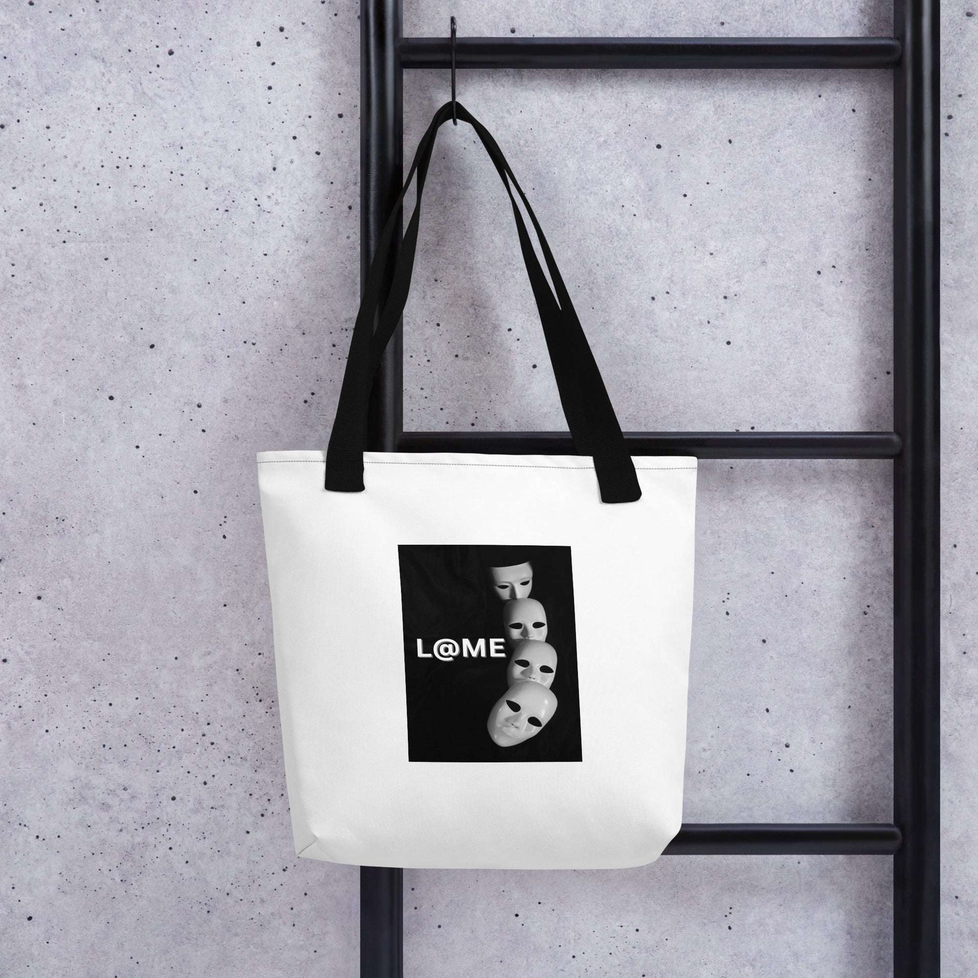 L@ME tote bag with falling masks print, 15x15 inches, cotton handles, polyester material