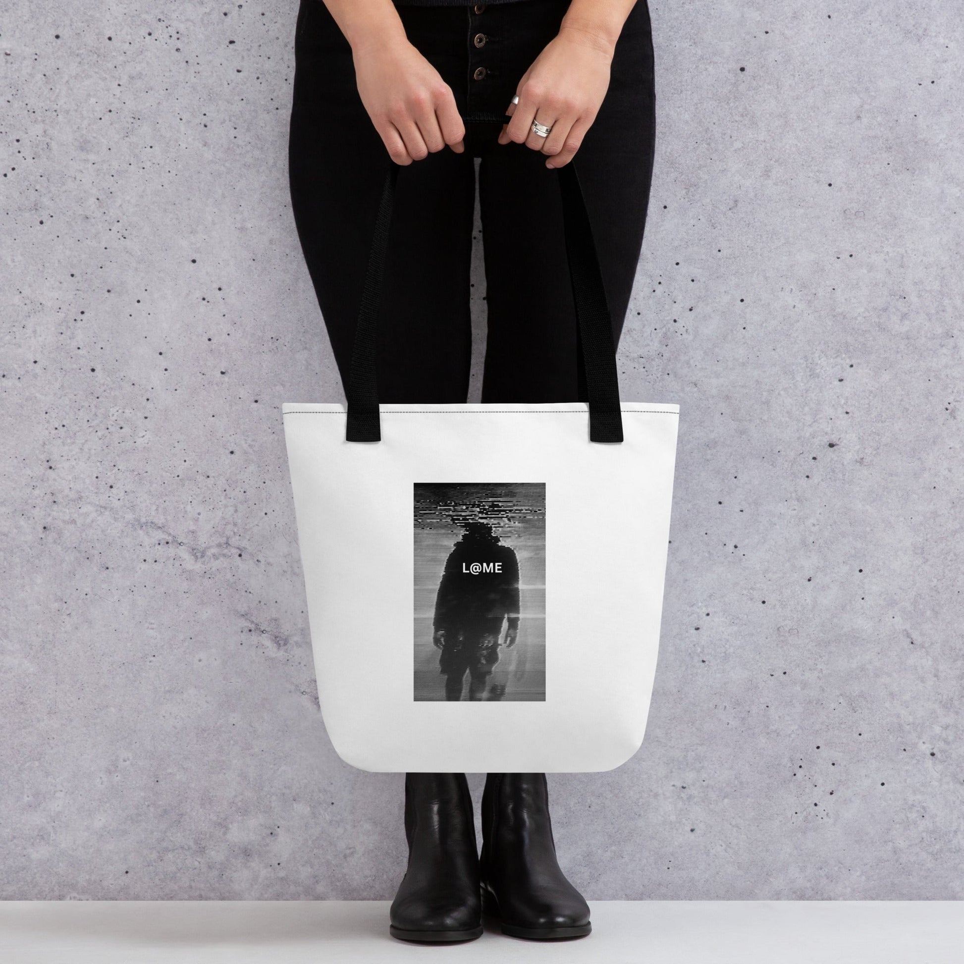Durable tote bag with a bold L@ME graphic and dual cotton handles for easy carrying.