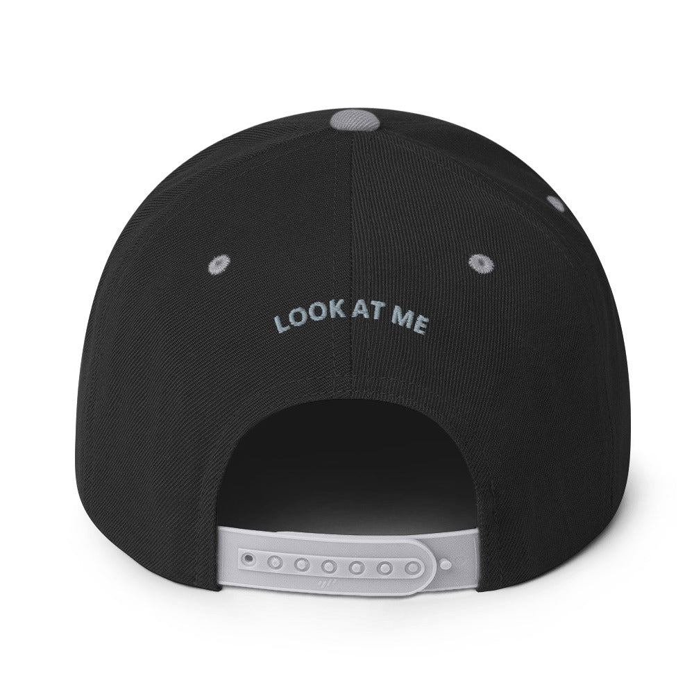 Classic snapback hat with a flat brim, high-profile fit, and embroidered L@ME logo.