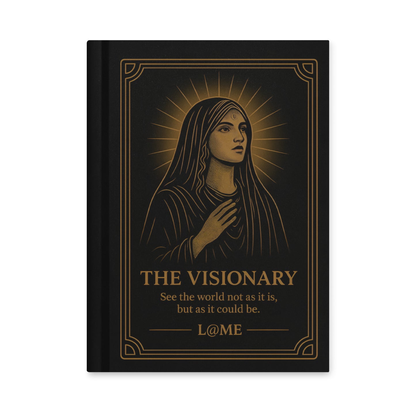 A matte hardcover journal with gold tarot-style artwork on a deep black cover.