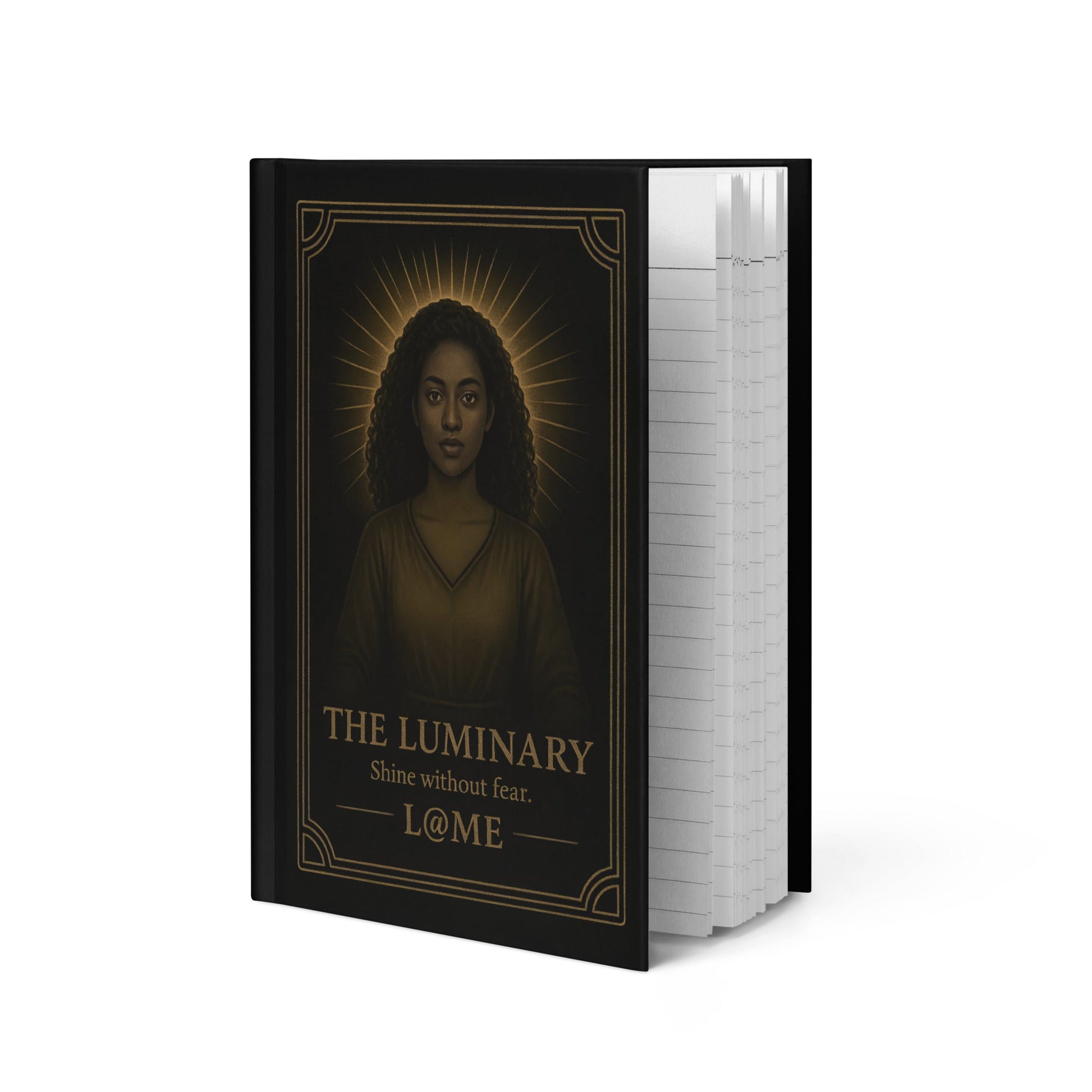Hardcover journal with gold "Luminary" tarot artwork on a matte black cover and lined pages.