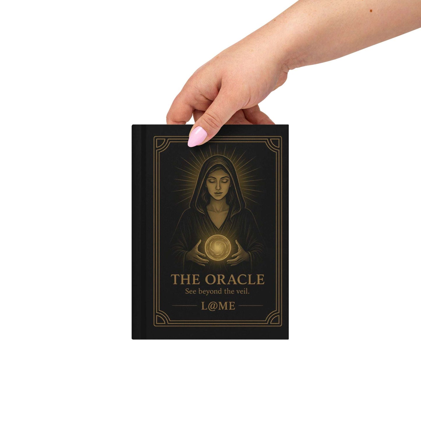 Hardcover journal with gold "Oracle" artwork on a matte black cover and lined pages.