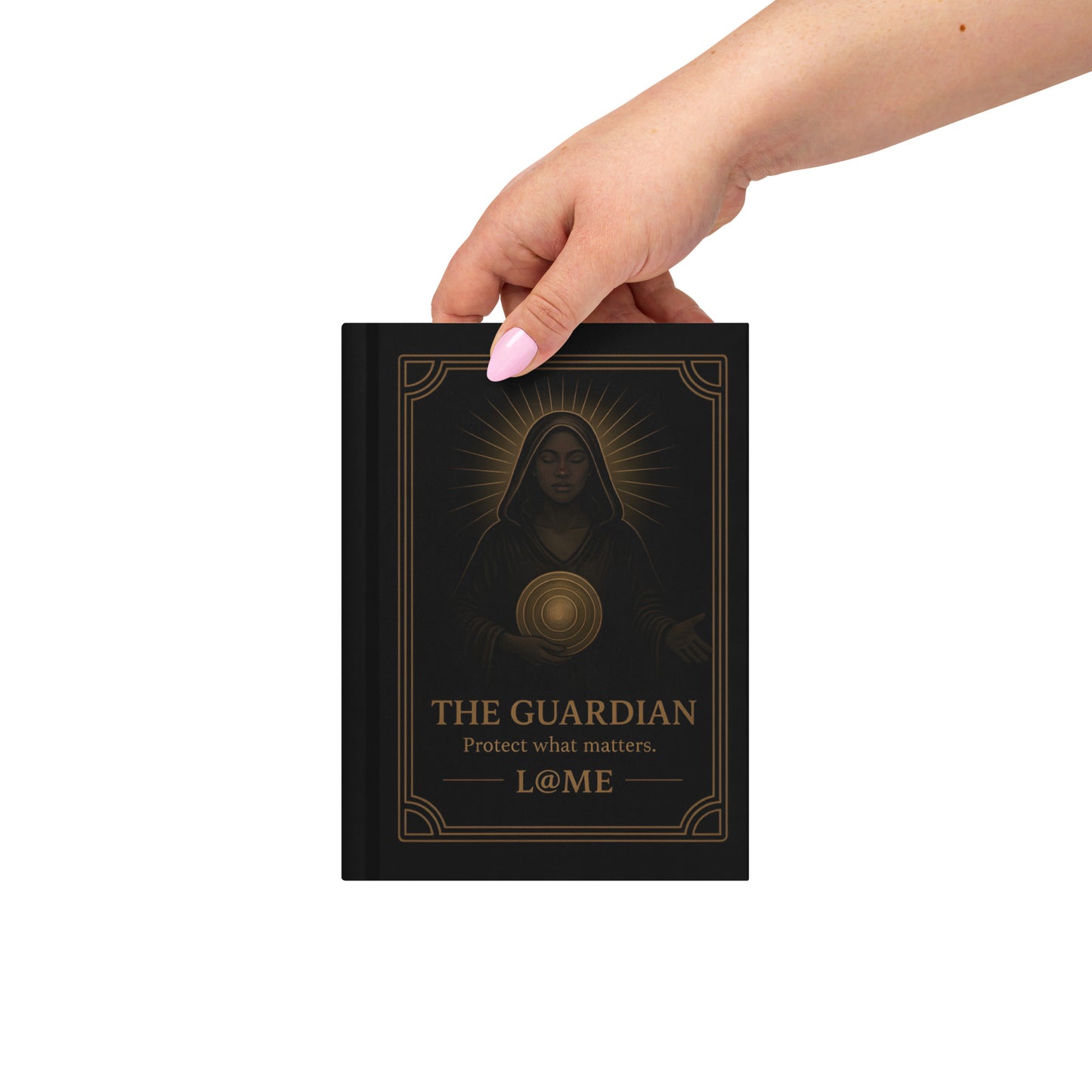A matte hardcover journal with gold "Guardian" artwork on a deep black background.