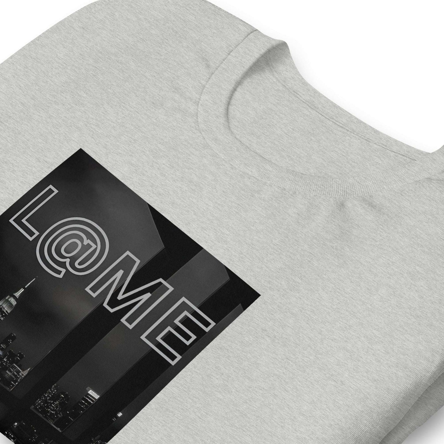 Black-and-white cityscape t-shirt featuring a neon-inspired L@ME logo.