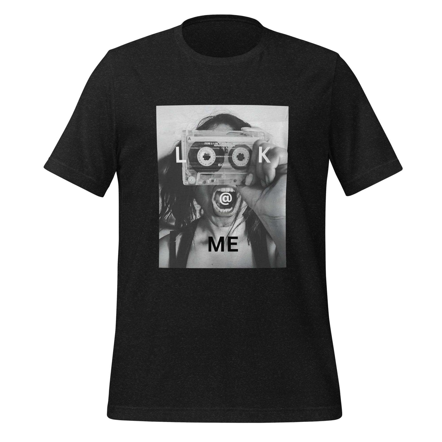 Monochrome tee featuring a woman holding a cassette like a camera, made of soft cotton.