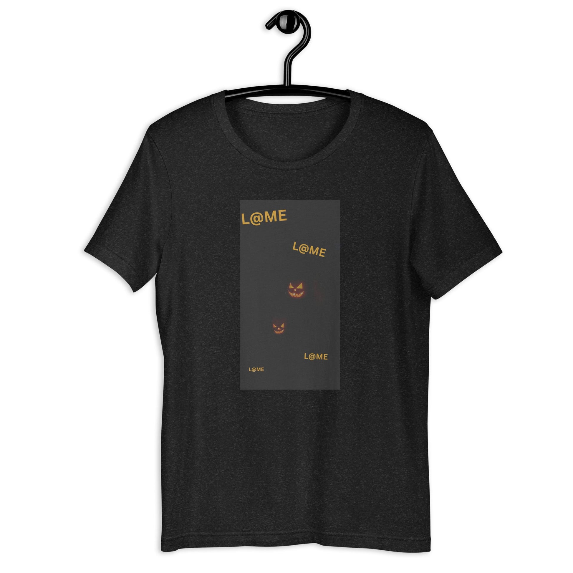 Black tee with subtle orange pumpkin faces blending into the dark background.