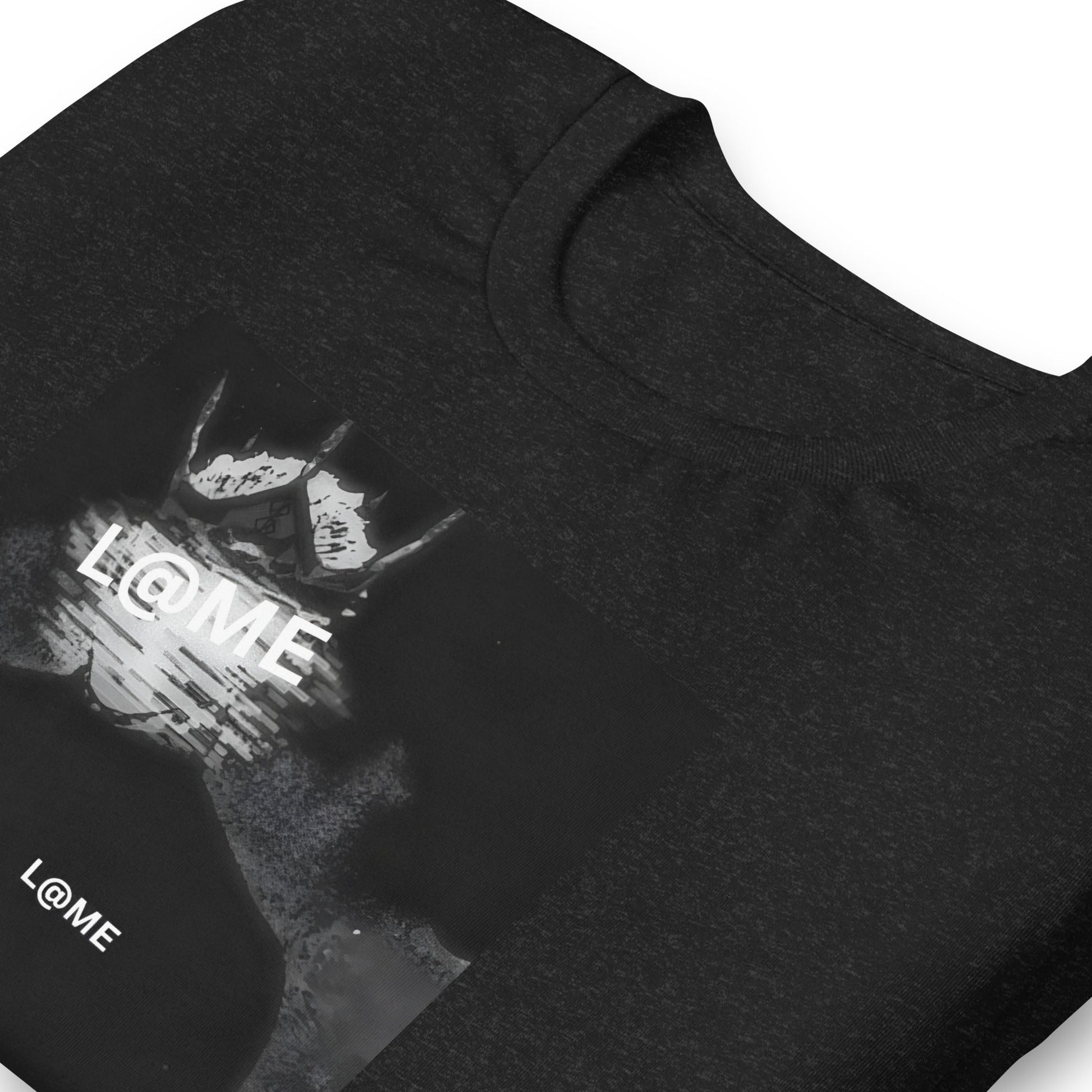 Black tee featuring a glitch-inspired design with abstract patterns and a relaxed fit.