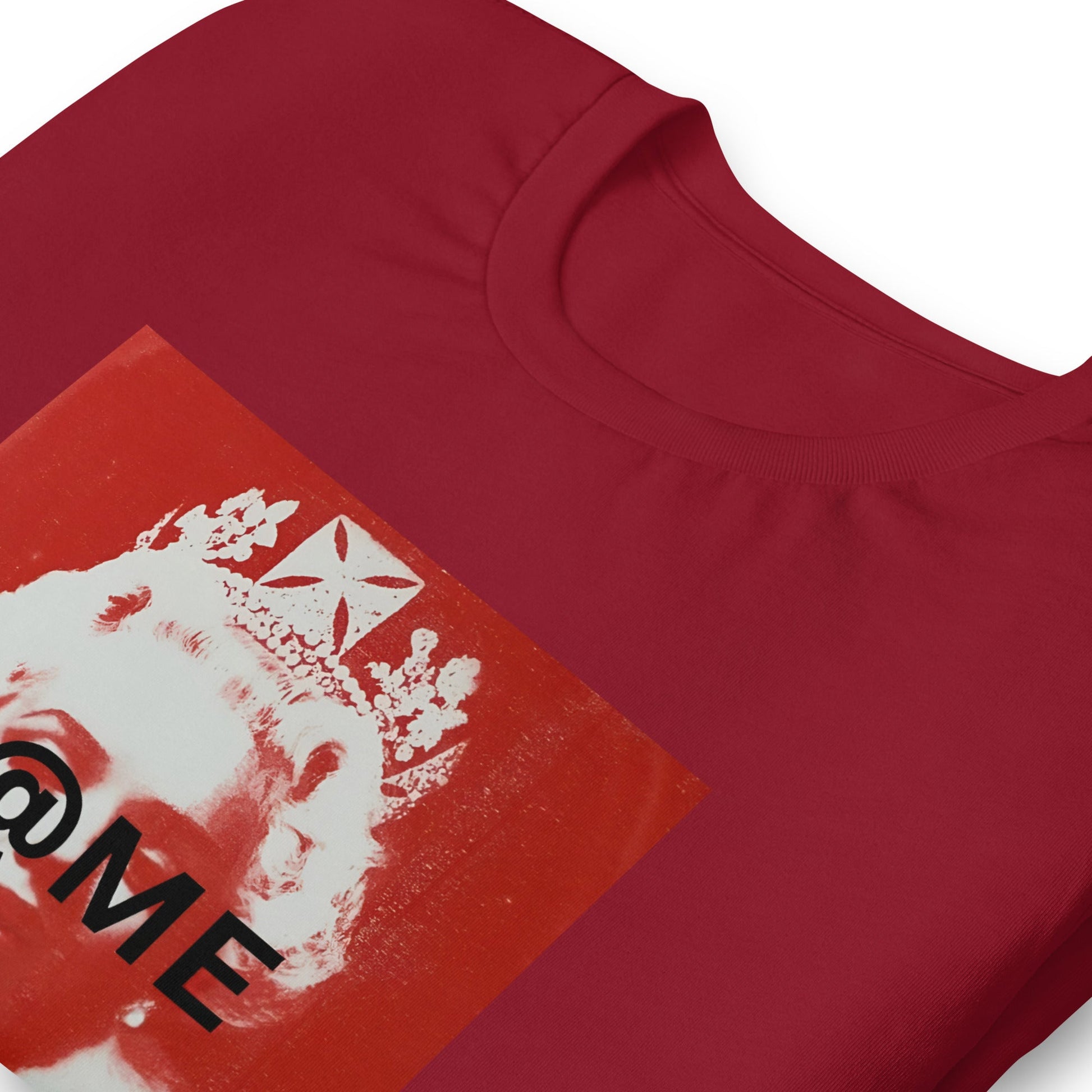 Red graphic tee with a modern street art royal figure on the front