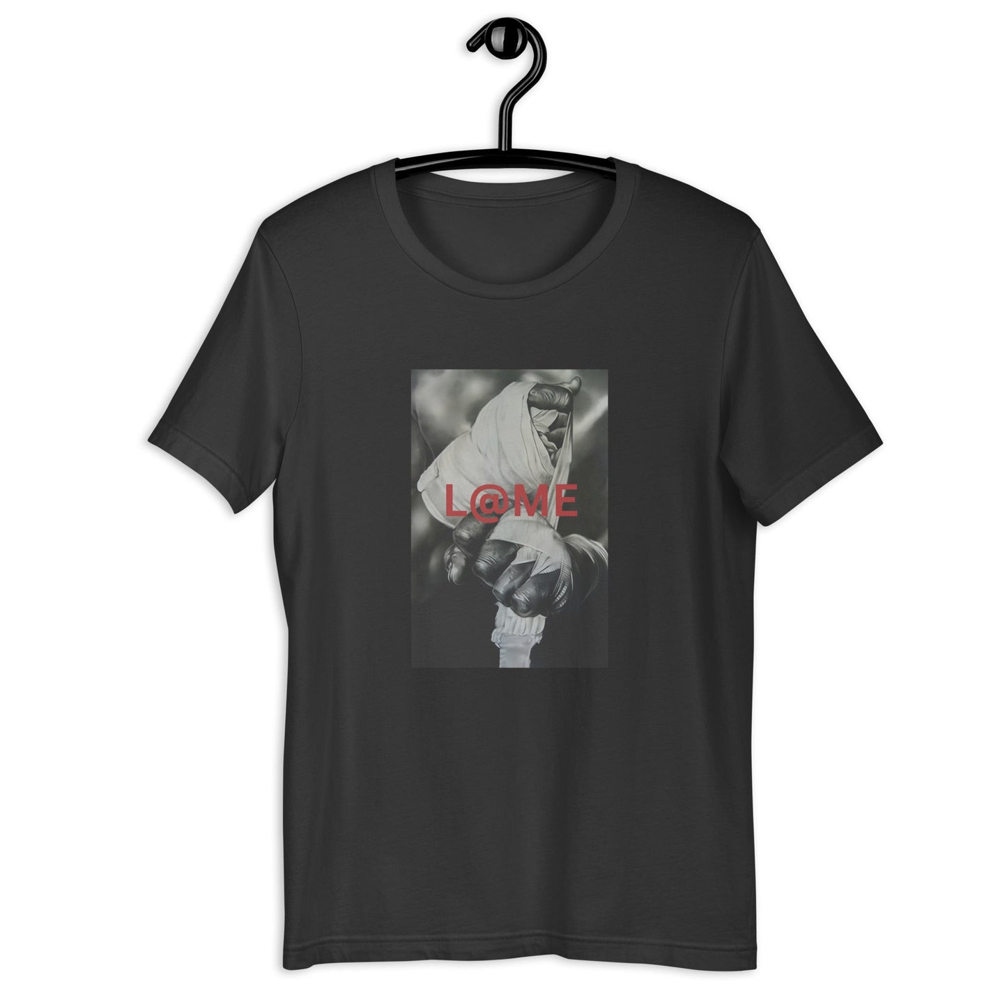 Close-up of a wrapped hand gripping tightly on a grayscale tee with red L@ME print.