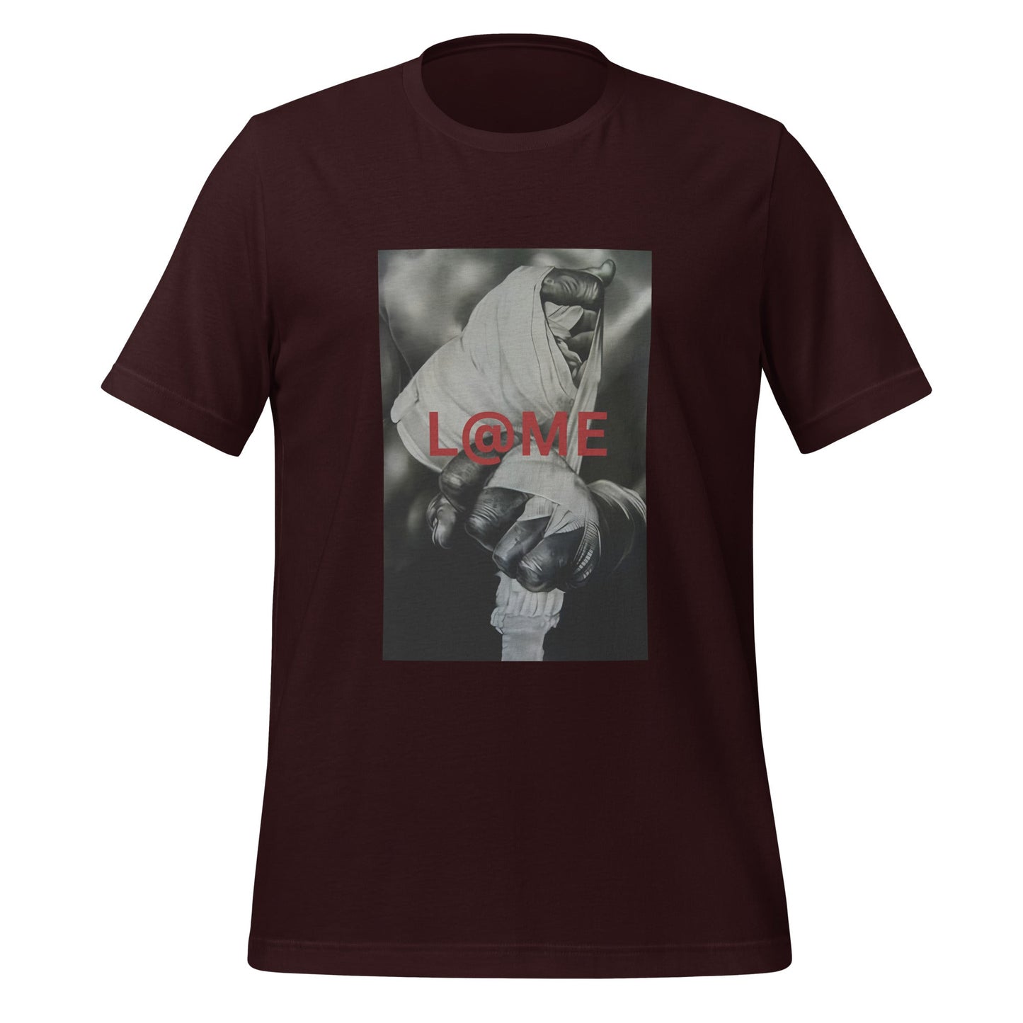 Close-up of a wrapped hand gripping tightly on a gray tee with red L@ME print.