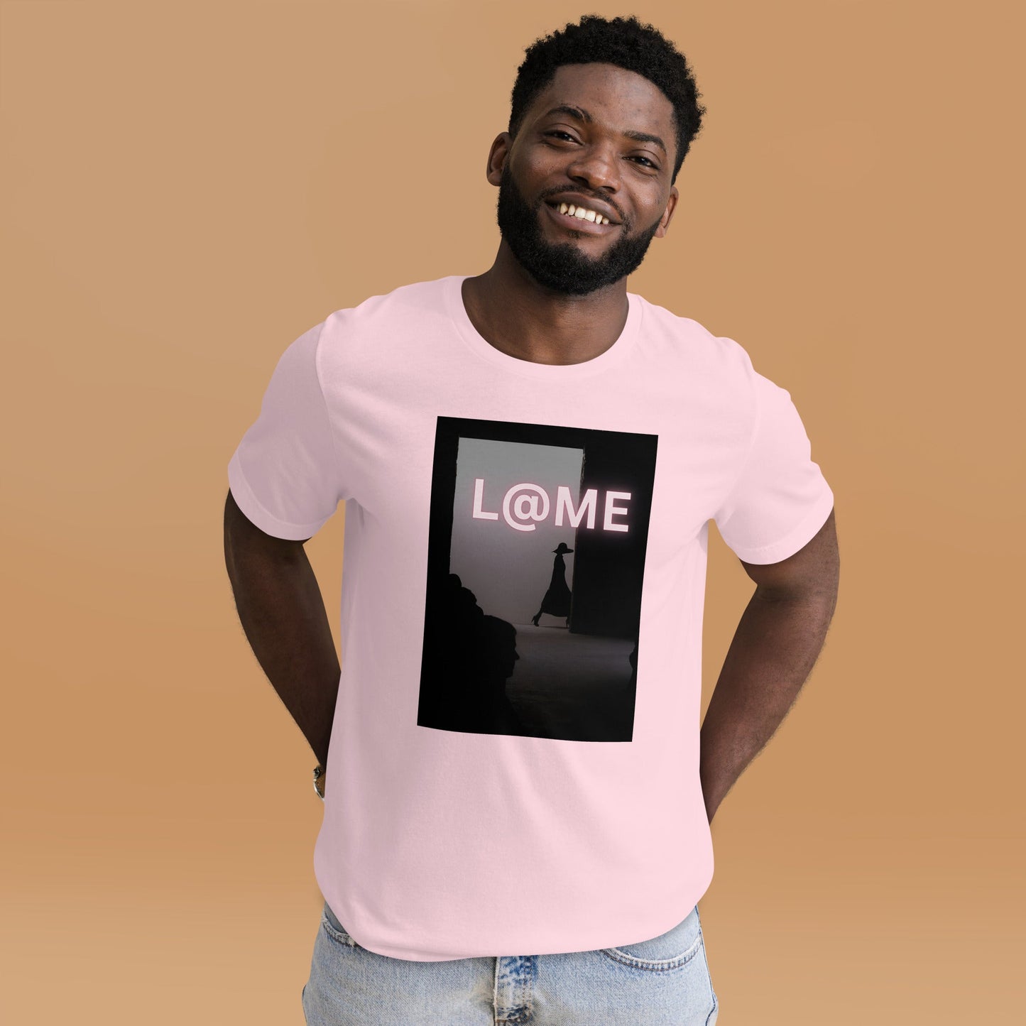 Soft blush-pink unisex tee with a shadowed doorway design and bold L@ME logo.
