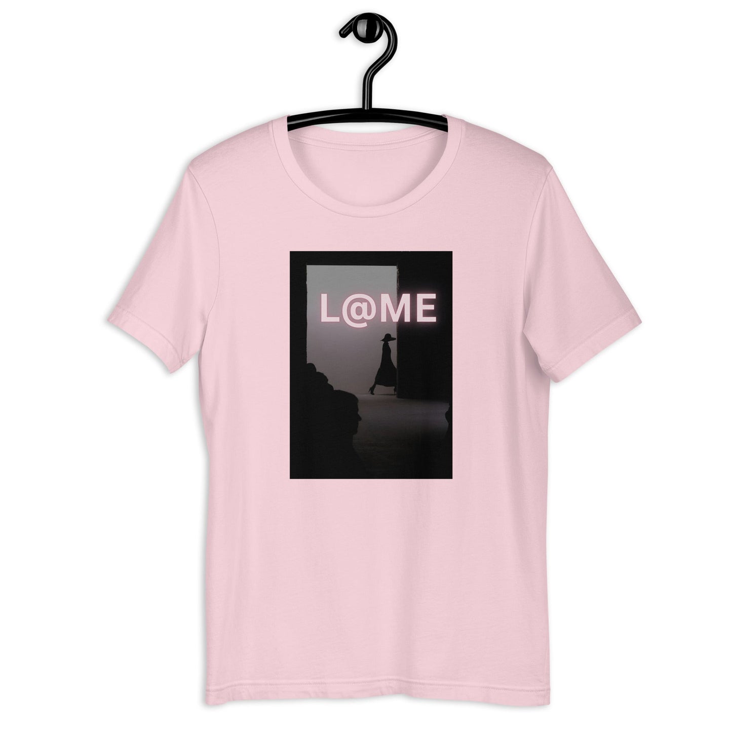A soft blush-pink unisex tee with a shadowed doorway design and bold L@ME logo.