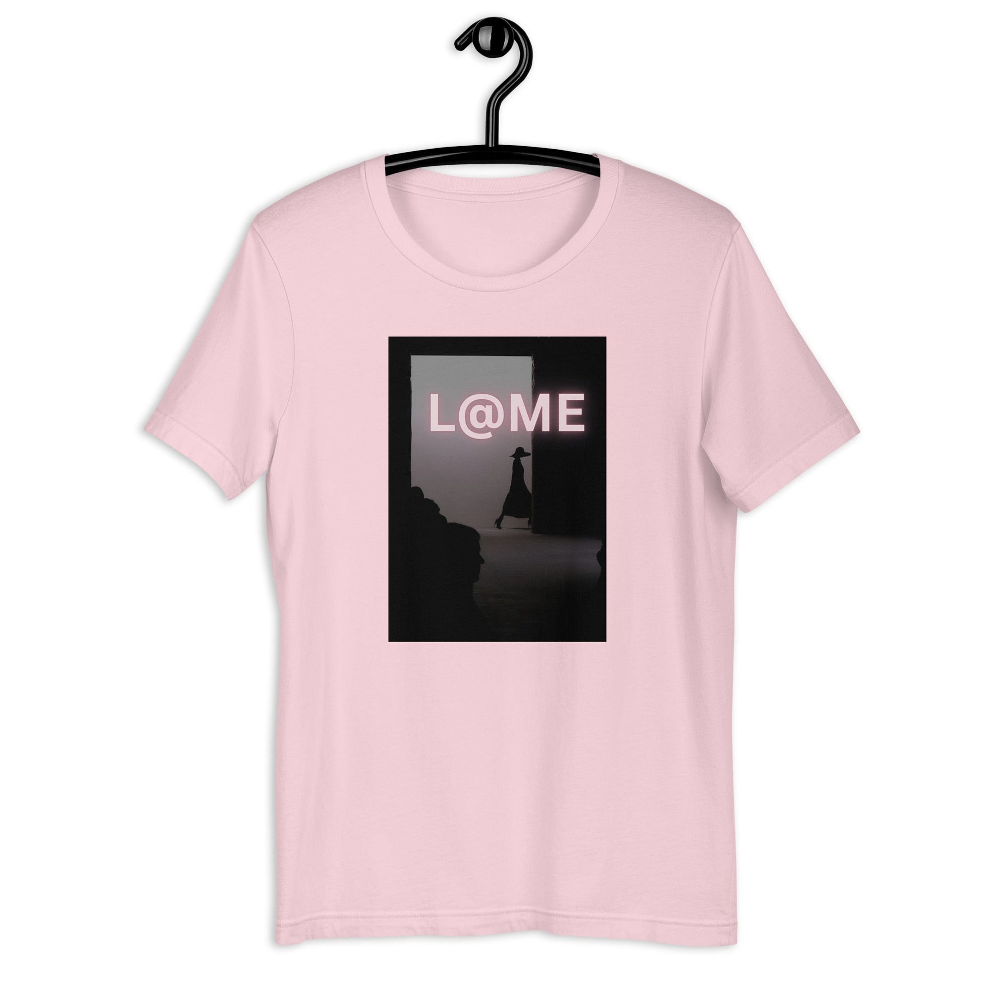 A soft blush-pink unisex tee with a shadowed doorway design and bold L@ME logo.